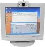 [Bilde: Skjerm med hodemus-mottaker montert &oslash;verst]